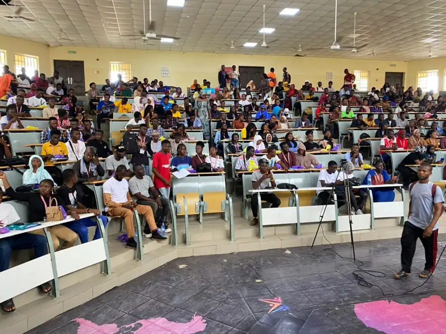 Students filling a lecture theatre